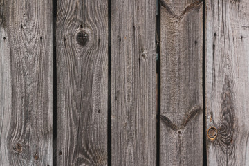 several vertical gray boards of the barn gate © Radoslaw