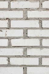 gray wall made of white bricks