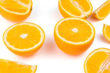 Oranges cut in half Placed on a white background, top view