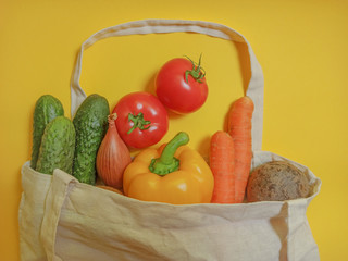 Vegetable set in a textile bag. Copy space for text