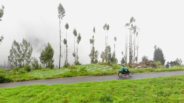 riding on a beautiful village with foggy weather