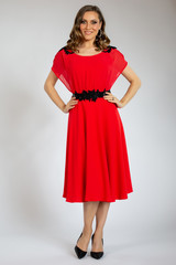 beautiful girl posing in red dress