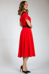beautiful girl posing in red dress