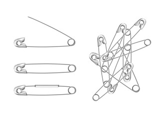 Fototapeta premium set of silver stainless steel safety pins, accessory for sewing in different angles, sewing tool for fasten pieces of clothing together. 