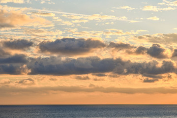 Scenic view of a cloudy sunset sky on the Mediterranean sea, Italy