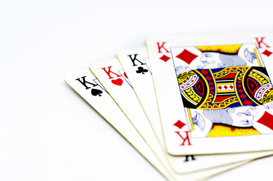 playing cards depicting the four kings isolated on a white background