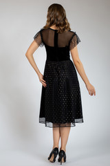 beautiful girl posing in black dress