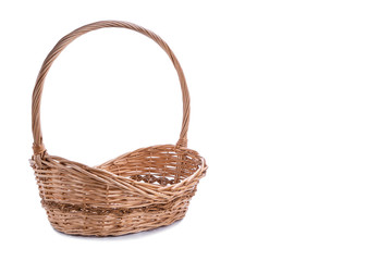 Fototapeta na wymiar Wicker basket with copy space isolated on white background