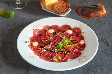 Marbled beef carpaccio. Top view, flat lay