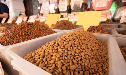 Dried cat and dog food in boxes. It is sold in the pet store. Close up.