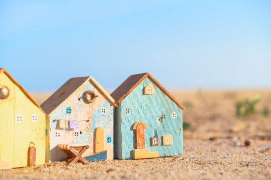 Real estate, lifestyle concept,Miniature house and car on blue sky background