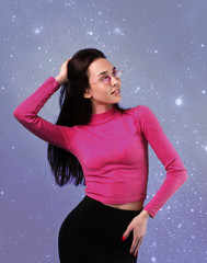 Mysterious girl on a background of the starry sky. Astrology. Girl and stars.