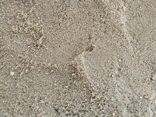 Sea sand texture in sunny day