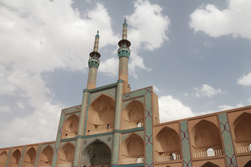 Amir Chakhmaq Complex Building over blue sky on a sand storm