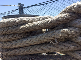 Rope large braided mooring line for ships boat background element on USS Iowa naval warship...