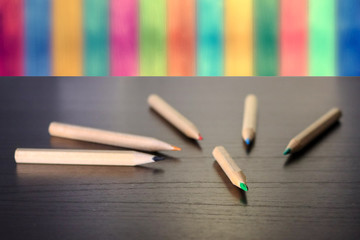 colored pencils on the table