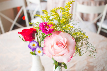 flower arrangement with roses for party