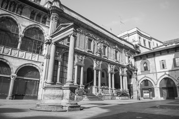 The famous square Mercanti, located in the center of Milan, close to Duomo, with the famous well on the left, monochrome