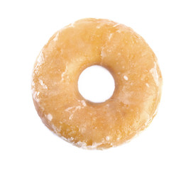 Sweet delicious glazed donut isolated on white, top view