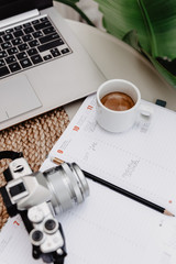 Coffee cup on the working desk. Concept of smart working