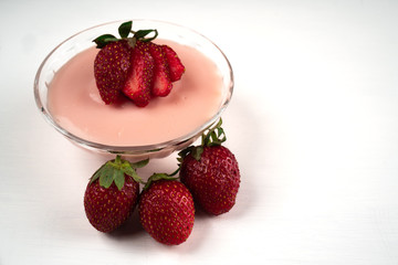 Strawberry pudding on white background