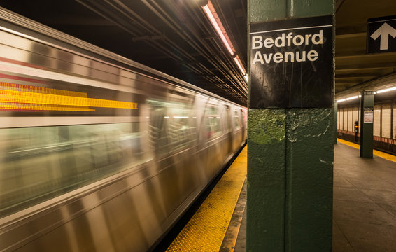 New York City - 17th May 2016: Subway L-train Speeding through Empty Bedford Avenue subway station in New York city