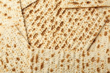 Traditional Matzos as background, top view. Pesach (Passover) celebration