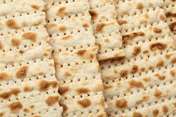 Traditional Matzos as background, top view. Pesach (Passover) celebration