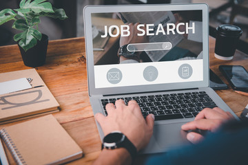 job search concept, find your career, Man looking at online website by laptop computer.People searching for vacancies or position on the internet, recruiting, finding jobs.Unemployed and poor economy