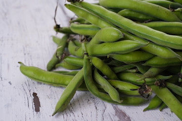 Fresh  broad beans in the pod close up