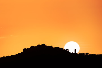 Sun setting behind Sant'Antonino in Corsica