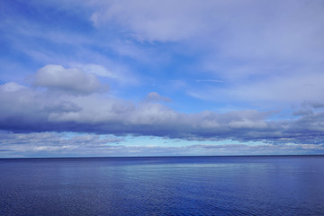 Fototapeta na wymiar lake view blue sky and clouds