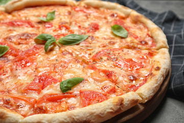 Delicious pizza Margherita on table, closeup view