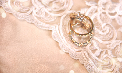 Wedding ring on the vintage lace