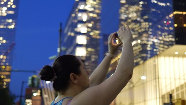 Girl Takes A Selfie on Financial Center Manhattan New York City in 4K Slow motion 60fps