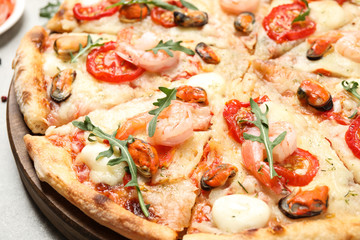 Closeup view of delicious fresh seafood pizza