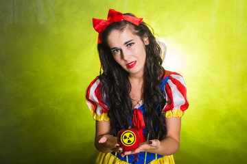 Woman wearing a fairy tale dress holding an apple with radiation symbol. Environmental problems...