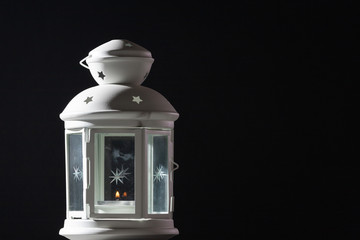 Vintage lantern on a black background