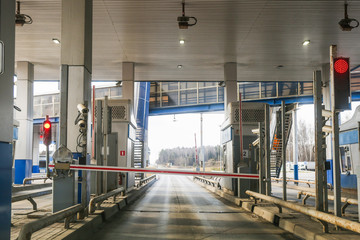 access point with a barrier on the highway. entrance to the paid section of the autobahn