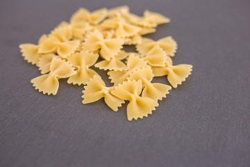 bow pasta on a dark background
