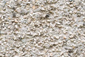 Flintstone in a frozen cement mortar, pattern, background, texture. stone wall