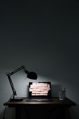 Image of laptop full of sticky notes reminders on screen. Late night work overload concept image....