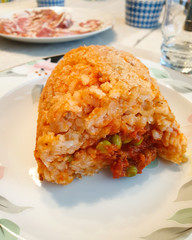 homemade dish with rice and meat sauce like an arancino