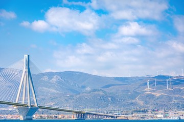 Obraz na płótnie Canvas The famous cable bridge Charilaos Trikoupis in Rio Antirio Greece on a sunny day with a blue sky