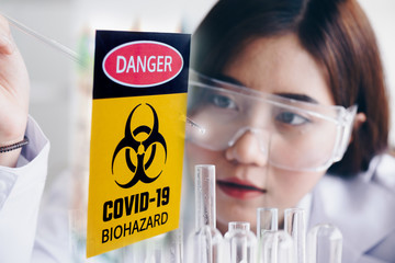 Coronavirus 2019-nCoV Blood Sample.  with sign danger  lab for vaccine