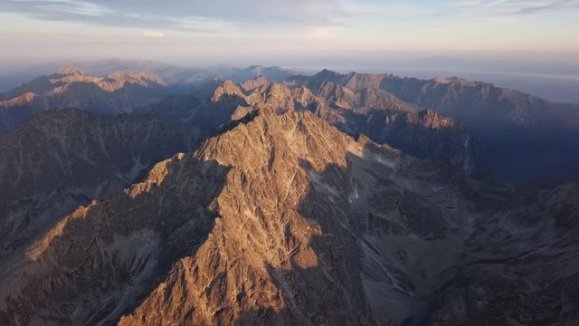 Aerial sunrise over of Gerlachov Peak (Gerlachovsky stit) in High Tatras (Vysoke Tatry) mountains, Slovakia