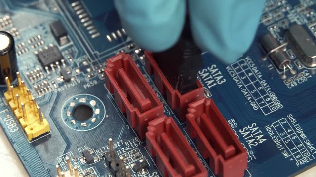 Macro shooting technician when connect the SATA cable to the SATA motherboard slot.