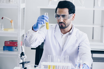 Coronavirus 2019-nCoV Blood Sample.  with microscope   lab for vaccine