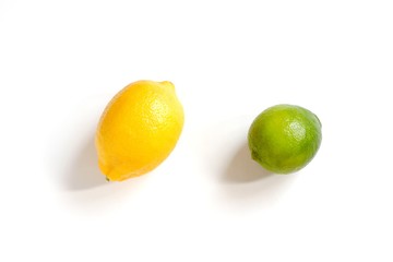 Fresh lemon and lime isolated on a white background. Citrus fruits. Flat lay food photography