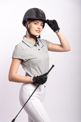 Portrait of a horsewoman on a white background